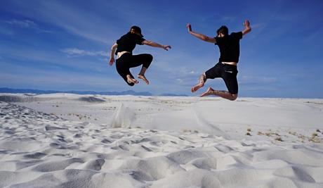 allison-and-eric-jump-dunes