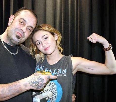 Miley Cyrus New Bicep Tattoo Miley Cyrus Adds Another Tattoo to the Pandora Box