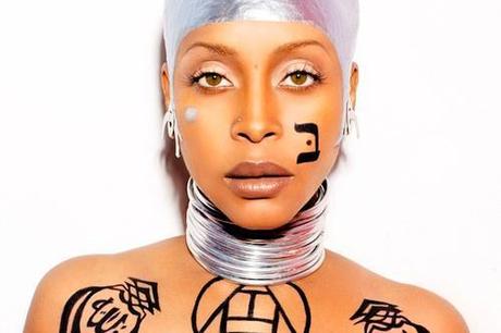 Erykah Badu Controversial Allah Tattoo US Singer Erykah Badu Kicked from Concert Over Controversial Tattoo