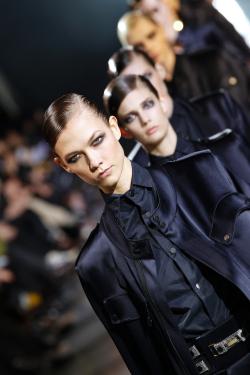 US model Karlie Kloss presents a creation by Belgian designer Anthony Vaccarello during the Fall/Winter 2012-2013 ready-to-wear collection show, on February 28, 2012 in Paris. AFP PHOTO/ALEXANDER KLEIN (Photo credit should read ALEXANDER KLEIN/AFP/Getty Images)