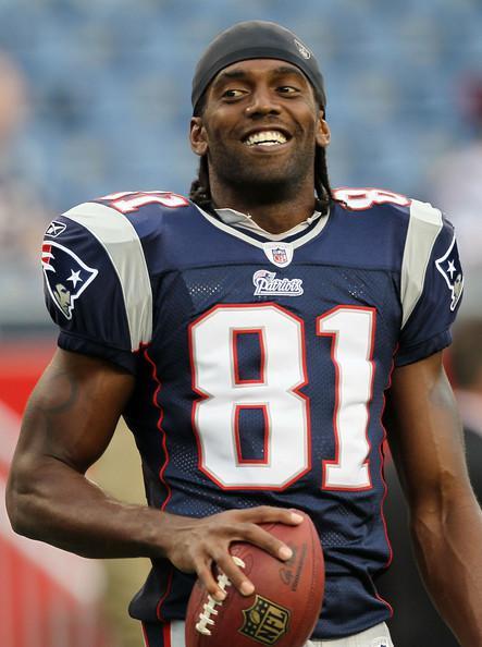 Randy Moss Randy Moss #81 of the New England Patriots holds the football before the preseason game against the New Orleans Saints at Gillette Stadium on August 12, 2010 in Foxboro, Massachusetts.