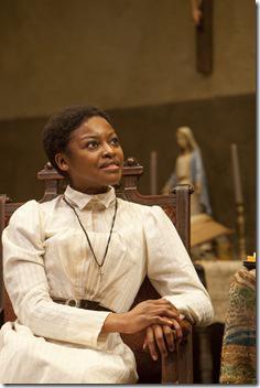 Pascale Armand (Jekesai/Ester) is content with her new life as a Christian in the world-premiere co-production of The Convert by Danai Gurira, directed by Emily Mann.