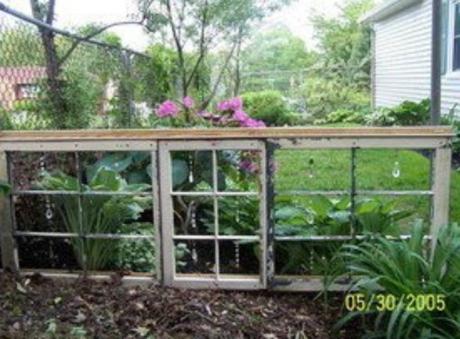 Top 10 Ways to Recycle and Transform Old Windows Old Windows Transformed Into a Garden Divider