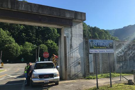 Crossing into West Virginia at Hatfield McCoy Marathon halfway point