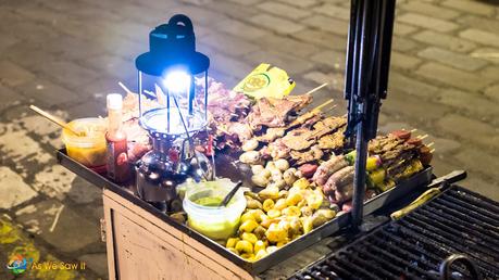 Nighttime photo of grill and food in Parque Calderon