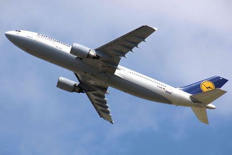 A Lufthansa A300B4-603 departs London Heathrow...