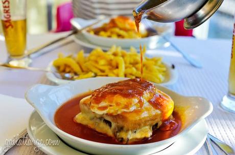 francesinha with a hit of spicy sauce