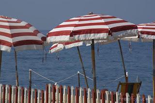 Image: Beach Parasol and sea, province of Imperia, Italy  (c) FreeFoto.com. Photographer: Ian Britton