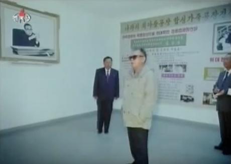 Late DPRK leader Kim Jong Il visits the revolutionary history exhibition at P'yo'ngso'ng Synthetic Leather Factory in South P'yo'ngan Province on October 7, 2011 (Photo: NK Leadership Watch file photo).