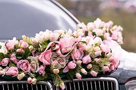 rented limousine and a bunch or flowers