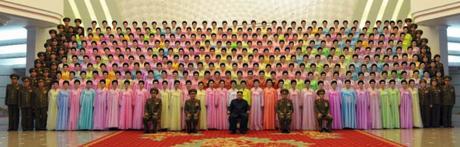 Commemorative photograph of Kim Jong Un, senior KPA command personnel and participants in an art contest of KPA officers' wives (Photo: Rodong Sinmun/KCNA).