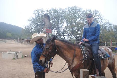 Getting ride for a horse ride in bandera, TX