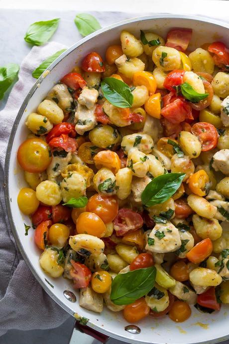 This summery Caprese Chicken Gnocchi Skillet cooks in 30 minutes using one pot, making it a perfect weeknight dinner!