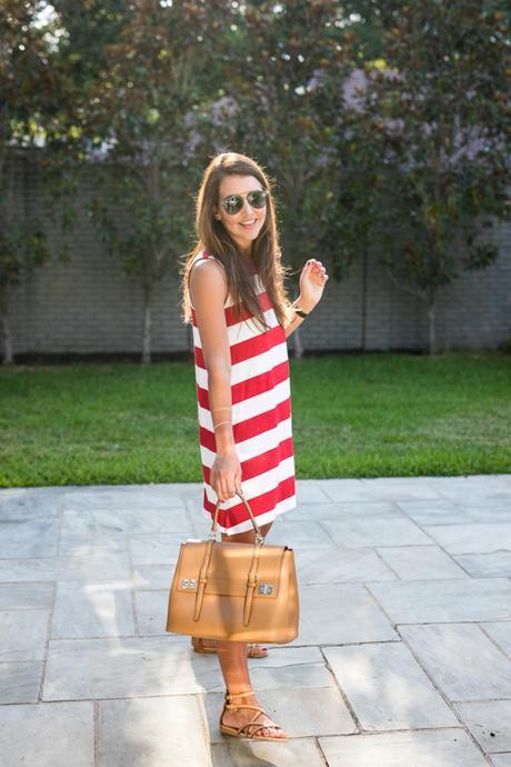 Amy Havins wears a red and white striped dress from Charming Charlie.