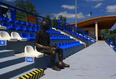 Backpacking in Poland: Top 20 Places to Visit in Starogard Gdański Kazimierz Deyna statue in the Stadium named after him