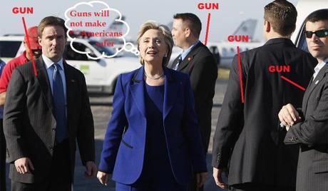 Gun-control Hillary Clinton surrounded by armed Secret Service agents