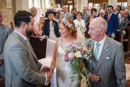 bride meeting her husband in church 