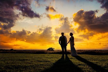 bride and groom in the sunset on a rustic wedding 