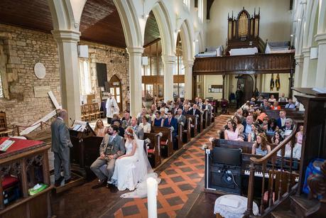 the wedding guests inside the church 