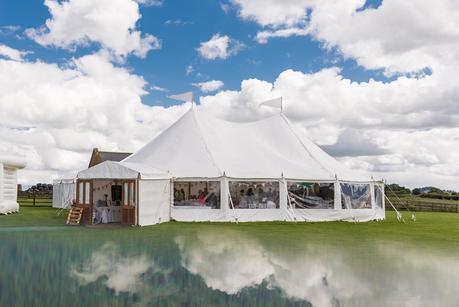 wedding marquee with clouds reflection 