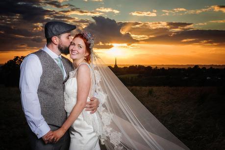 bride and groom in sunset