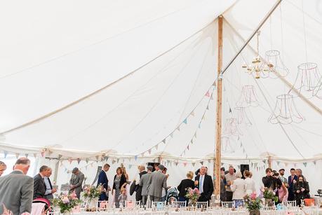 wedding guests in a marquee