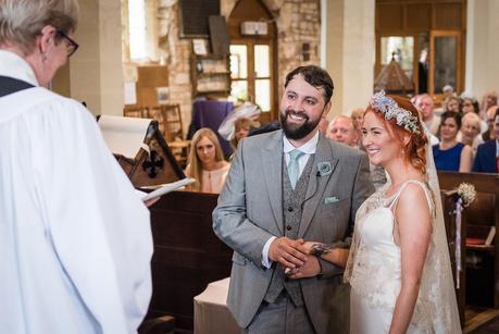 bride and groom smiling after being married 