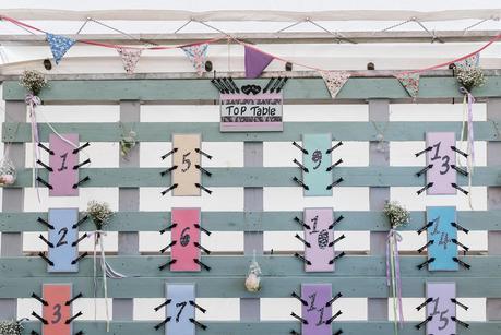 a wedding table plan made out of old pallets 