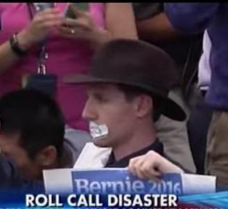 Bernie delegate with mouth taped shut