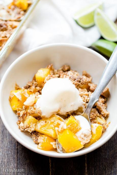 This Mango Pineapple Crumble has an irresistible coconut macadamia nut crumble topping. This is a gluten-free, vegan, and refined sugar free crumble that will bring your tastebuds to the tropics!