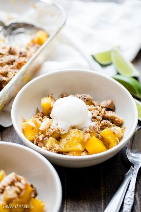 This Mango Pineapple Crumble has an irresistible coconut macadamia nut crumble topping. This is a gluten-free, vegan, and refined sugar free crumble that will bring your tastebuds to the tropics!