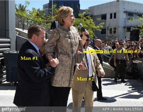 Hillary propped up by man in L.A., April 2016