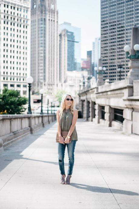 When transitioning from summer to fall with jeans it's important to mix different pieces that can balance each other. Mixing jeans with sleeveless tops and open toed shoes help keep your fall look light and airy.  Click through to see more tips! 