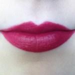 City Color Lipstick in Heartbreaker on lips