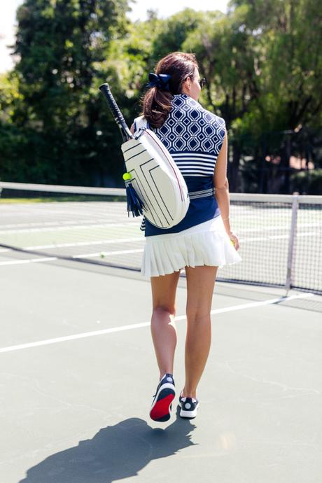Amy Havins wears a tennis outfit from Tory Sport.
