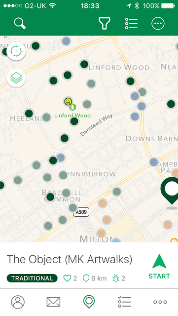 Geocaching app showing the map where you can chose which  cache to look for