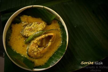 Hilsa fish cooked in mustard sauce(Sorshe Ilish)