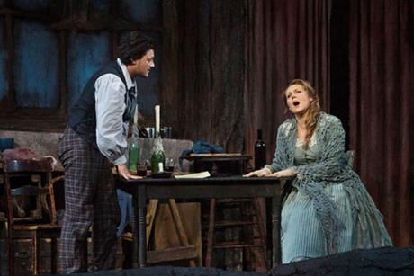 Vittorio Grigolo as Rodolfo with Kristine Opolais as Mimi in La Boheme (AP Photo/Metropolitan Opera, Marty Sohl)