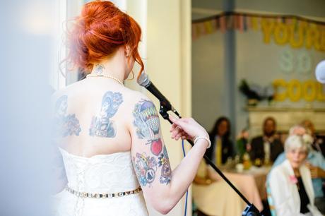 Tattoo Wedding Tips Bride giving Speech with red hair