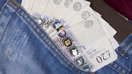 money in a pocket saved on heating