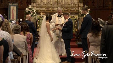 exchanging wedding rings at ceremony st marys west derby
