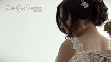 bride looking over shoulder while getting ready for wedding ceremony in liverpool