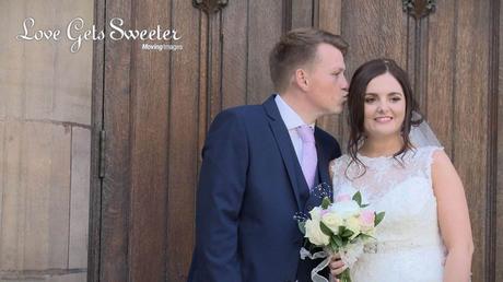 groom kissing bride outside st nicholas church liverpool