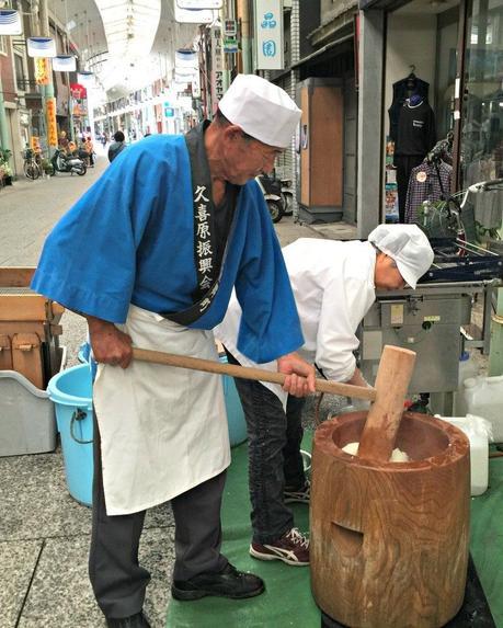 pounding rice to make dough