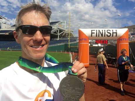 Mike Sohaskey with Omaha Marathon medal