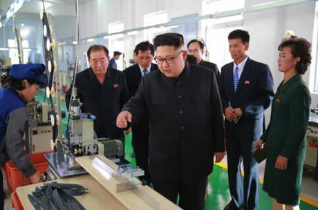 Kim Jong Un views a manufacturing area of the Mangyo'ngdae Revolutionary Site Souvenir Factory (Photo: Rodong Sinmun).