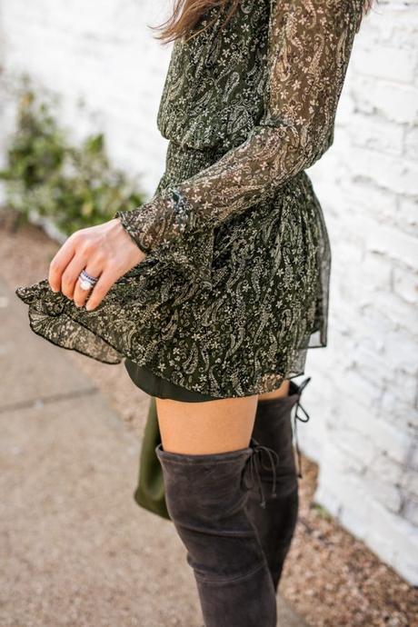 Amy Havins wears a Shoshanna dress paired with Stuart Weitzman gray over the knee boots.