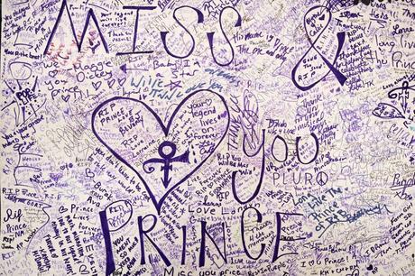Fans say bye to Prince on a mural outside Paisley Park.