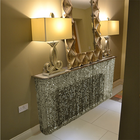 Crystal radiator cover in a hallway