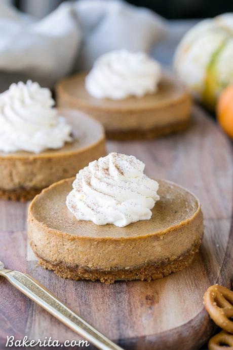 These Mini Pumpkin Cheesecakes have a crunchy, salty pretzel crust that pairs irresistibly well with the spiced pumpkin cheesecake filling! Topped with a swirl of whipped cream, this is a gluten-free dessert everyone will go nuts for - it's perfect for the holidays.